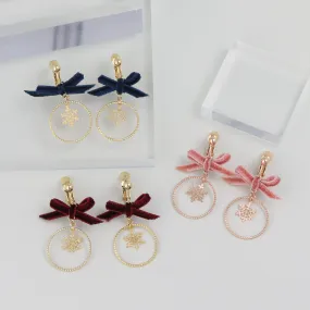 Bow and Snowflake Clip On Earrings